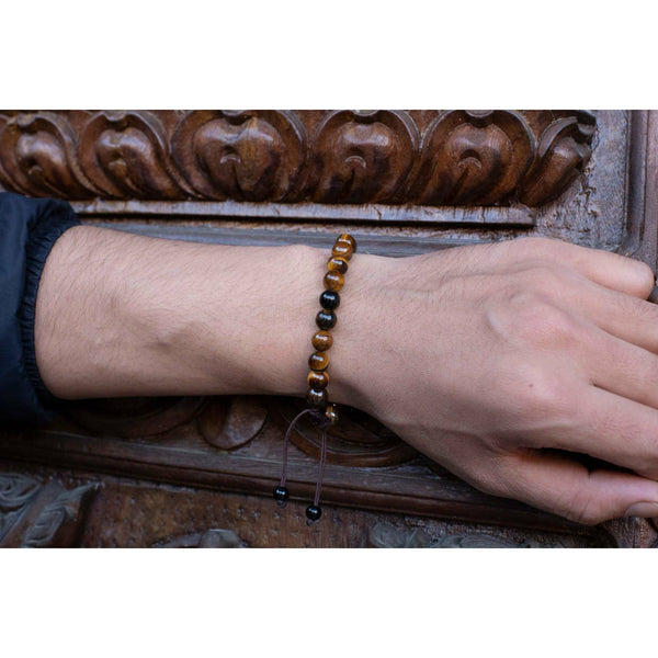 Designer tiger eye bracelet for man and women avaliable at Art Of Tibet. The price oftiger eye mala starts from 40$.