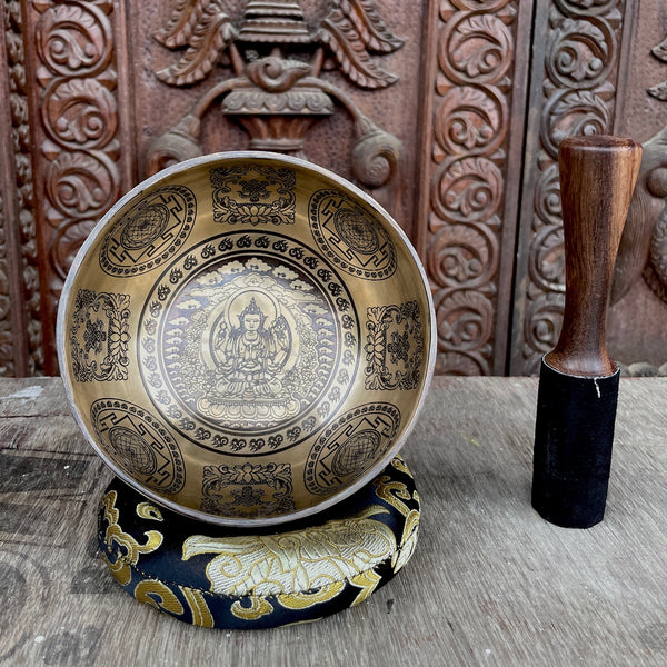 Chenrezig with Eight Auspicious Symbols Carved Singing Bowl