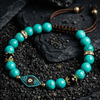 Tibetan Turquoise and Onyx Evil Eye Charm Bracelet - Art Of Tibet